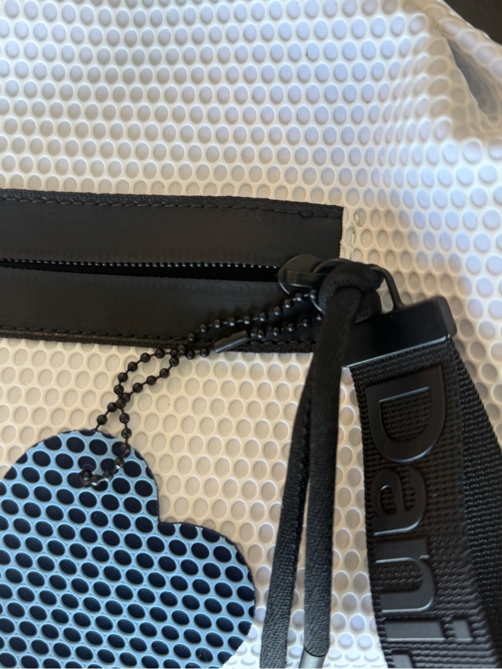 White Vegan Crossbody Belt Bag with Black Trim - Picture 3 of 11